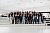 Ein Teil des Teams, das hinter dem Porsche Museum steht - Foto: Porsche