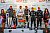 DUNLOP 60-Podium: Fabian Plentz/Carrie Schreiner, Markus Winkelhock/Kevin Arnold und Fabian Vettel/Russell Ward (v.l.) - Foto: Dirk Pommert